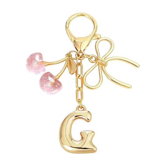 Cherie – Bijou de sac initiale nœud cerise (Rose)