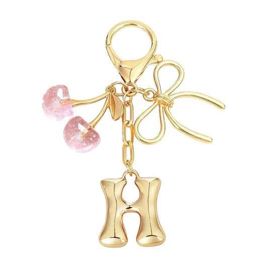 Cherie – Bijou de sac initiale nœud cerise (Rose)