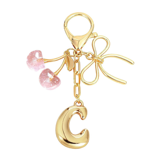 Cherie – Bijou de sac initiale nœud cerise (Rose)