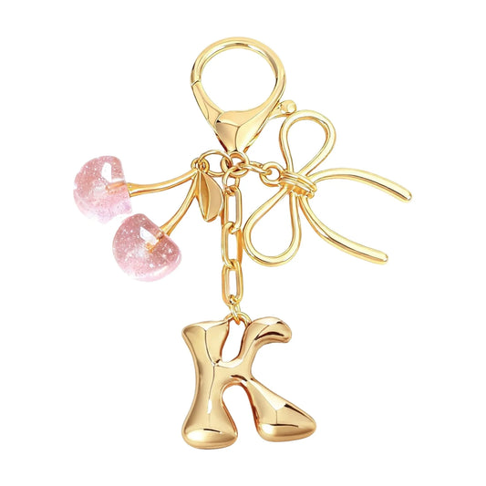 Cherie – Bijou de sac initiale nœud cerise (Rose)