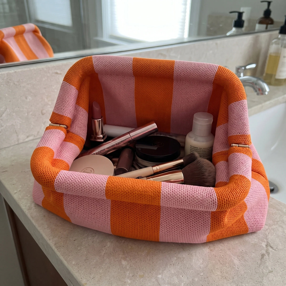 Knitty – La trousse à maquillage à fermoir clic